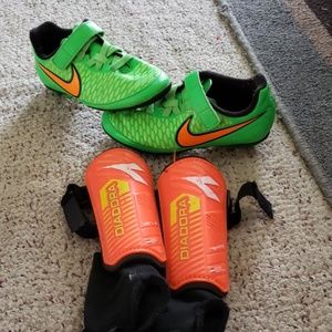 Kids Nike soccer cleats and shin gaurds